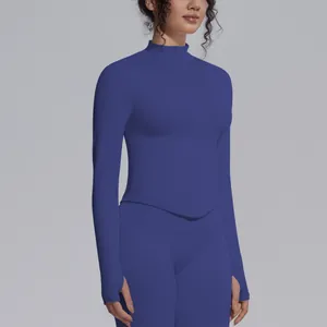 Front view of seamless slim-fit blue yoga jacket with high neck and zipper detail