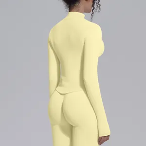 Detailed back view of high-stretch seamless athletic yoga top in pale yellow for women