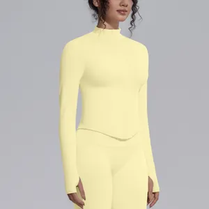Professional pale yellow seamless yoga jacket with stand collar and thumbholes for women