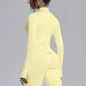 Rear view of women's seamless high-stretch breathable yoga jacket in pale yellow