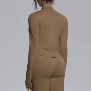 Back view detail of brown seamless long-sleeved athletic stand collar yoga top for women