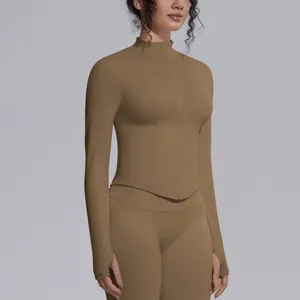 Detailed view of seamless brown athletic jacket featuring stand collar and thumb holes