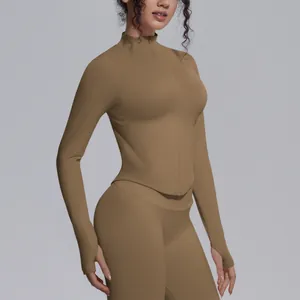 Close-up view of a khaki seamless long-sleeved athletic yoga top with stand collar and zipper