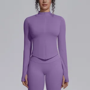 Front detail view of a seamless purple athletic zip-up jacket for women's fitness