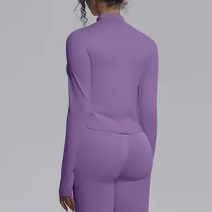 Back view of seamless purple long sleeve athletic top with mock neck for yoga workout