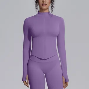 Close-up of purple seamless high-neck zipper sports jacket with thumb hole sleeves.