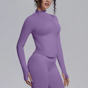 Detail view of purple yoga jacket featuring high collar and front zipper closure