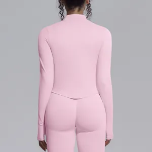 Back view of a tight-fitting pink seamless sports jacket for yoga and fitness training