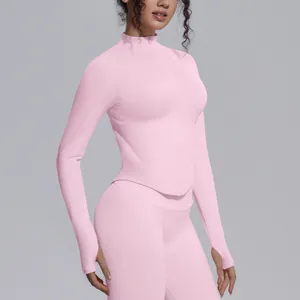 Close-up of pink seamless high-elastic yoga jacket with stand-up collar and front zipper.