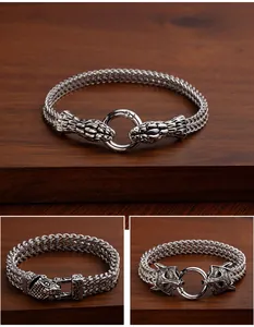 Detailed view of punk stainless steel bracelets with snake and beast head clasps