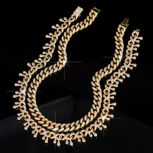 Close-up of hip-hop gold Cuban link necklace with iced-out thorn and drip design