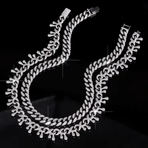 Close-up detail of iced out dripping thorn Cuban link chain in brilliant silver finish