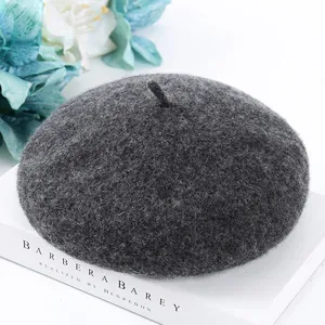 Detailed view of a soft grey wool beret hat perfect for autumn and winter fashion style