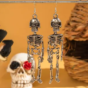 Boucles d'oreilles pendantes squelette argentées vintage style gothique
