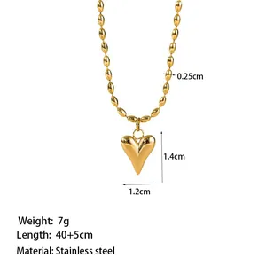 Gold stainless steel rice bead necklace featuring a minimalist 3D heart pendant