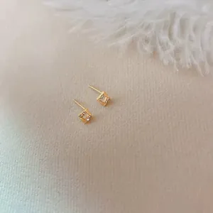 Minimalist geometric square gold stud earrings featuring sparkling zircon crystals
