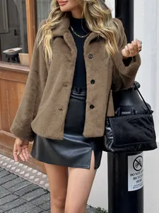 Close-up detail of a stylish brown faux fur jacket worn with a black leather skirt