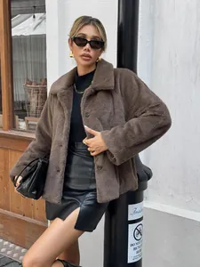 Chic brown faux fur coat for women with stylish outdoor urban street fashion style
