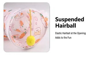 Close-up of pink cartoon pet tunnel with hanging yellow elastic ball detail.