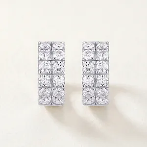 Close-up of 925 sterling silver hoop earrings with double-row moissanite stones
