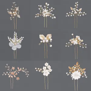 Elegant set of 9 bridal hairpins featuring pearls, rhinestones and golden leaf designs