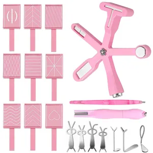 Detailed view of pink cat eye nail art magnet set with various patterns and pens.