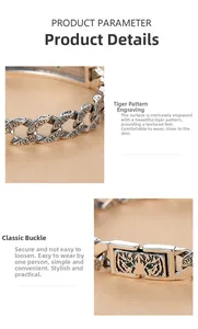 Close-up of vintage silver bracelet with intricate tiger totem relief and secure clasp