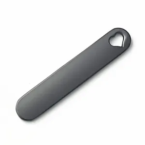 Detailed view of grey matte stainless steel tag with heart cutout for engraving