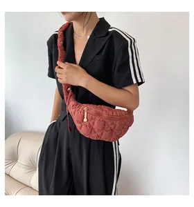 Fashionable red quilted dumpling crossbody chest bag with adjustable drawstring strap