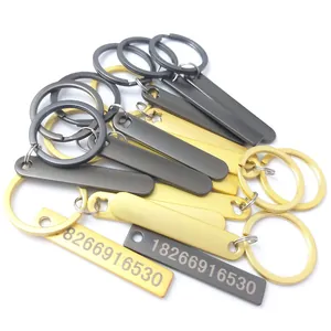 Custom engraved metal anti-lost keychains with phone number display in gold and grey