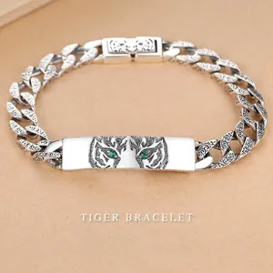 Vintage 925 silver tiger totem bracelet with intricate engravings and green stones