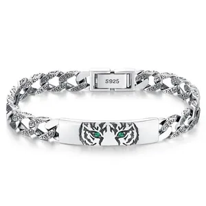 Vintage S925 sterling silver tiger head bracelet with green eyes and arabesque patterns
