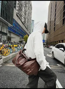 Stylish vintage brown PU leather travel bag for business trips and weekend getaways