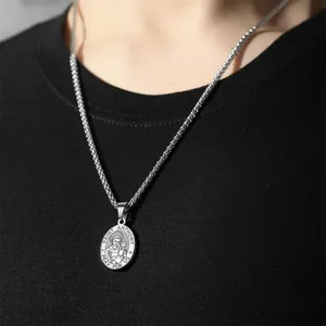 Religious Saint Anthony portrait medal necklace in stainless steel worn by male model