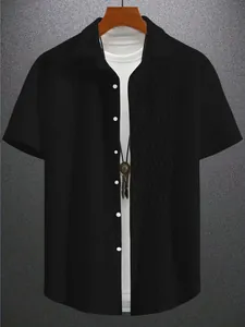 Close-up of black men's knitted short-sleeved shirt with diamond jacquard pattern