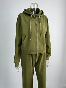 Detail view of olive green zip-up hoodie tracksuit set with relaxed fit for women