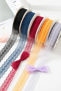 Detailed view of multicolored wavy lace ribbons used for DIY crafts and gift wrapping