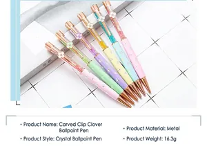 Close-up detail of colorful crystal ballpoint pens with four-leaf clover clips and metal body