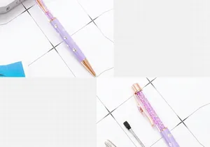Detail of purple clover crystal ballpoint pen showing sparkling crystals and barrel