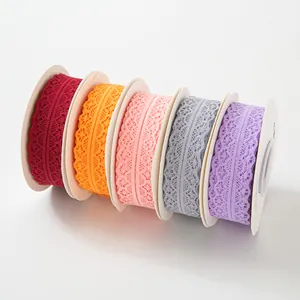 Assorted color 3cm hollow lace ribbon rolls for floral packaging and DIY crafts