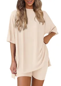Close-up of comfortable oversized beige two-piece lounge set for women summer wear.
