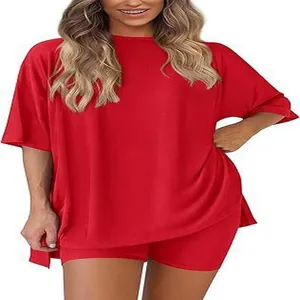 Vibrant red two-piece pajama set featuring an oversized top and biker shorts for women