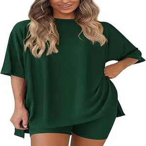 Two-piece dark green oversized women's lounge set with short sleeves and shorts