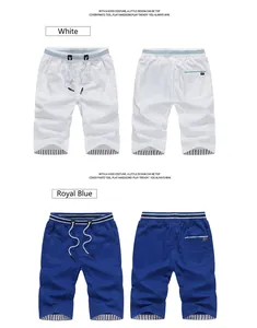 Detailed view of men's summer casual thin shorts in white and royal blue colors.