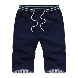 Casual men's navy blue summer shorts with drawstring waist and striped hem details