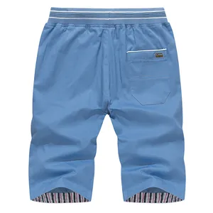 Men's light blue casual summer beach shorts with striped elastic waistband back view