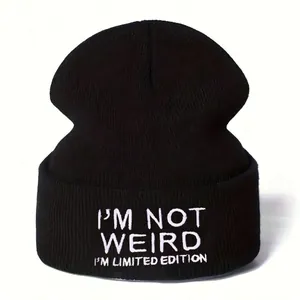 Y2K style black knitted beanie featuring 'I'M NOT WEIRD' white letter embroidery