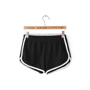 Women's loose athletic yoga shorts with elastic waist and stylish contrast piping detail