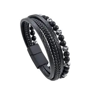 Close-up of men's multi-layer braided leather bracelet with natural stone and marble beads