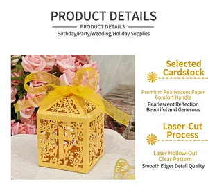 Close-up of yellow laser-cut candy box featuring intricate cross and floral designs and ribbon